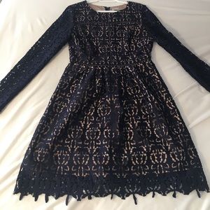 A navy lace patterned dress